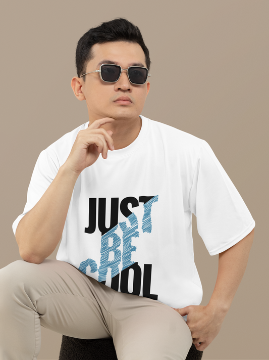 Oversized Urbaxo t-shirt with "Just Be Cool" text design, relaxed streetwear in casual style