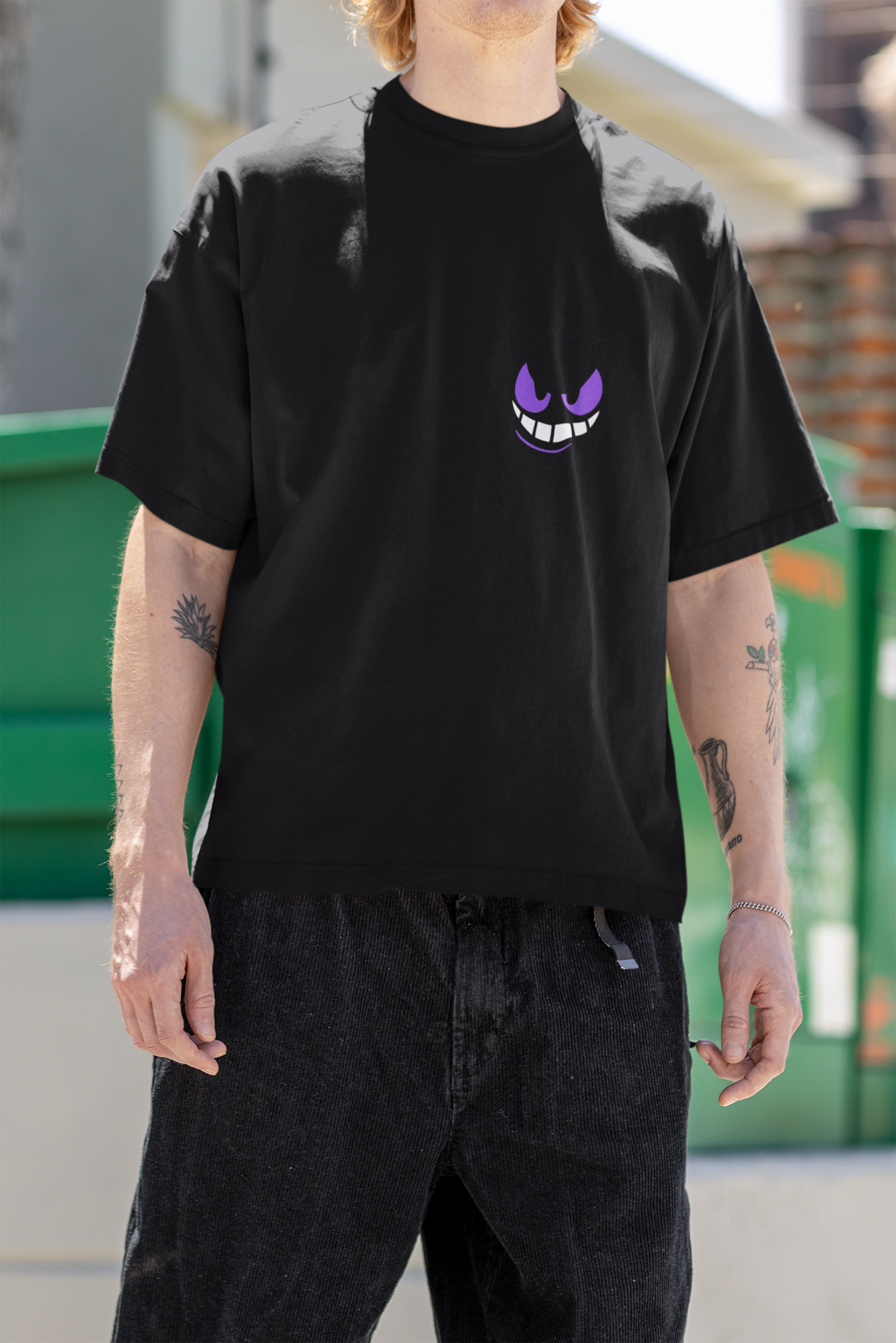 ront and back view of the Monster Oversized T-shirt by Urbaxo, featuring bold, graphic artwork with a monster design. The shirt has a relaxed fit and is perfect for casual streetwear