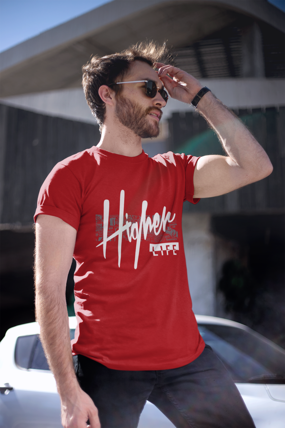 Flat-lay of TUY Higher Life red T-shirt by Urbaxo, highlighting smooth cotton texture, regular fit, and bold minimalist graphic