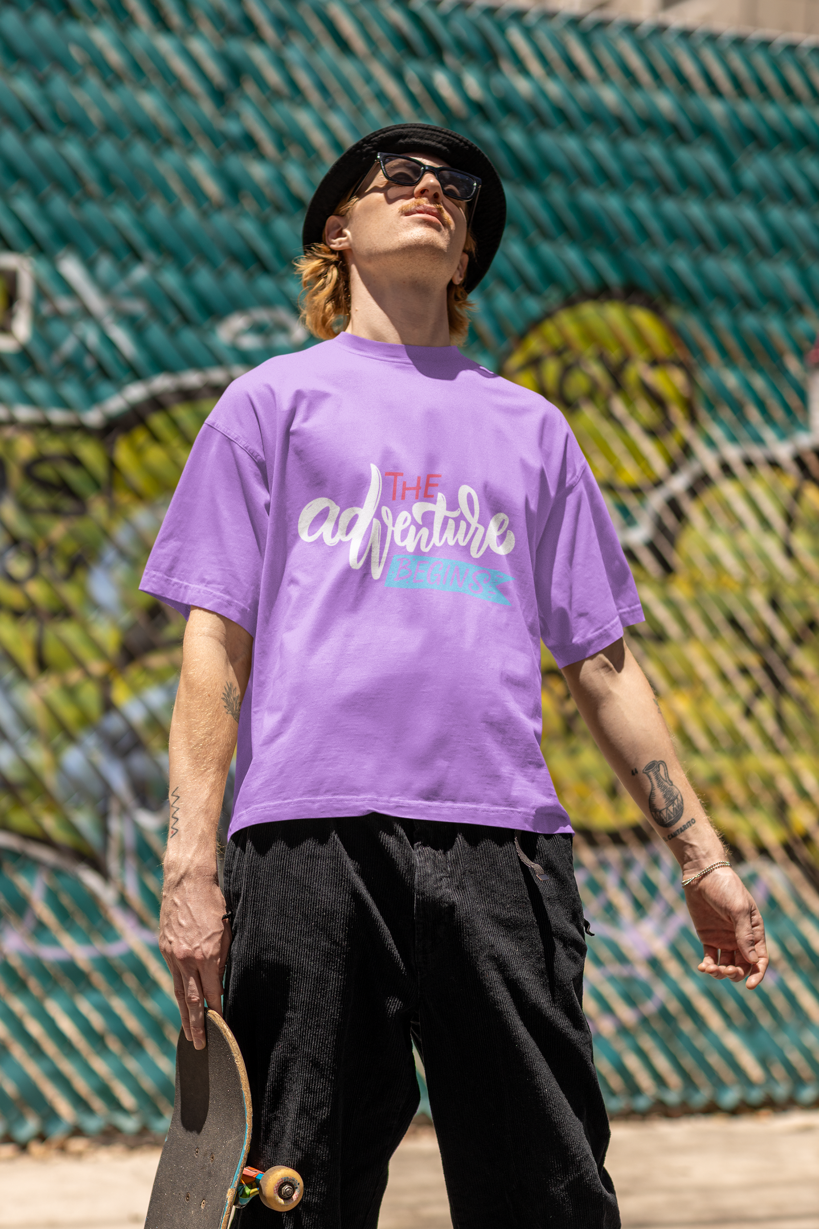Lavender Adventure T-shirt by Urbaxo laid flat, displaying front design and relaxed fit.