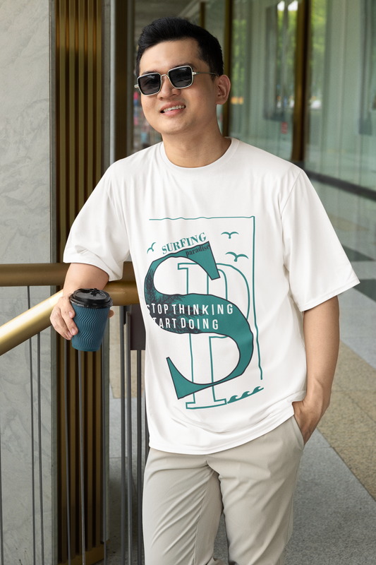 Model wearing the California Oversized White T-shirt from Urbaxo, front-facing casual look.